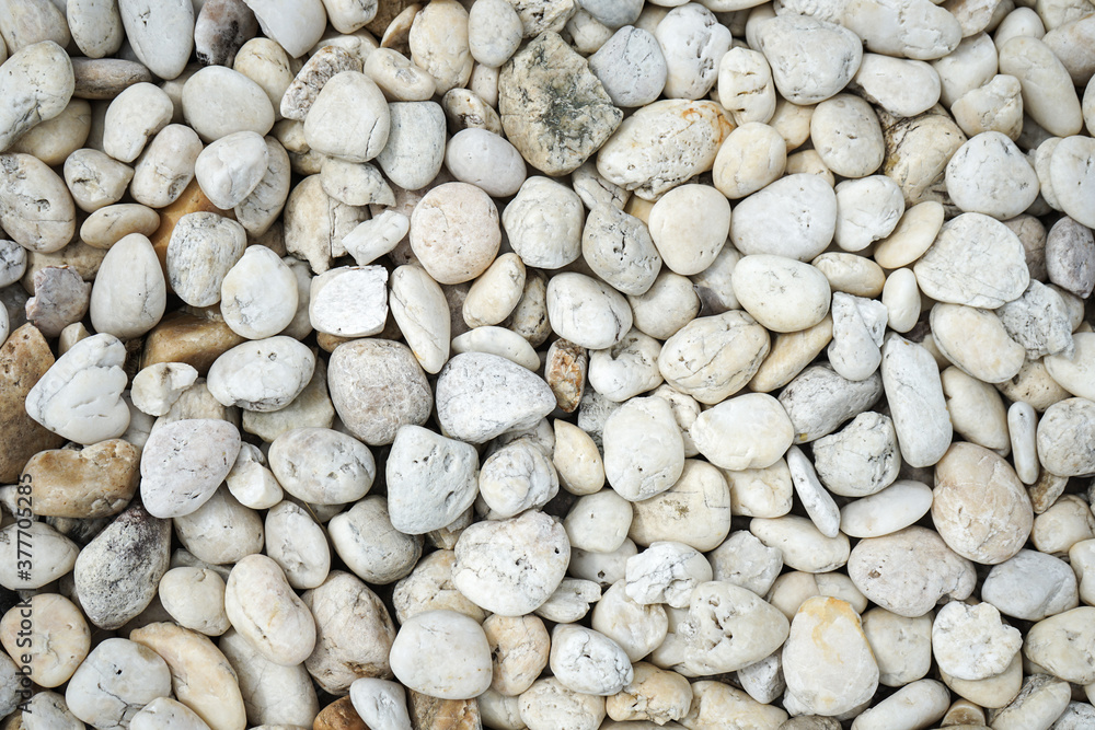 White bebbles stone or river stone background with vintage filter White bebbles stone or river stone background with vintage filter