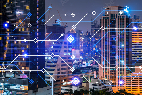 Information flow hologram, night panorama city view of Bangkok. The largest technological center in Asia. The concept of programming science. Double exposure.