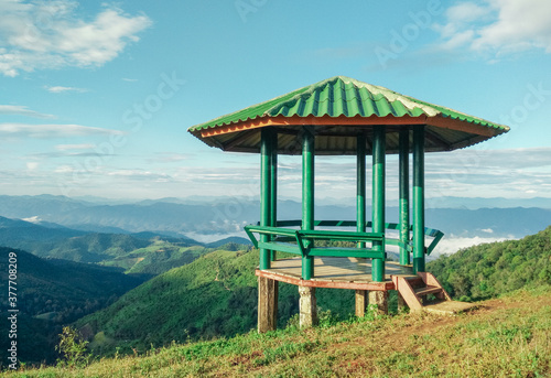 The octagonal pavilion with green open-air is located on the hill It is a viewpoint before reaching the top of Pui Ko Mountain, Mae Hong Son, Thailand. © aeysiriamnat