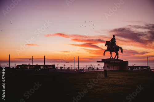 silhouette of a horse at sunset © Laura