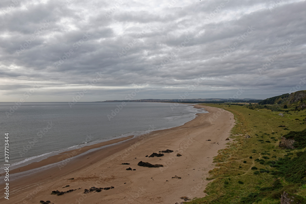 The long sandy beach at the St Cyrus Nature Reserve, an unspoilt piece of Coastline on the East of Scotland near to Montrose. The long sandy beach at the St Cyrus Nature Reserve, an unspoilt piece of Coastline on the East of Scotland near to Montrose.