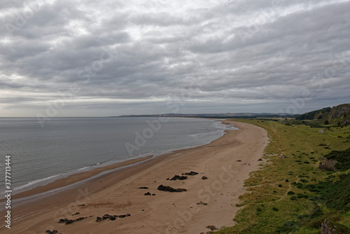 The long sandy beach at the St Cyrus Nature Reserve, an unspoilt piece of Coastline on the East of Scotland near to Montrose.