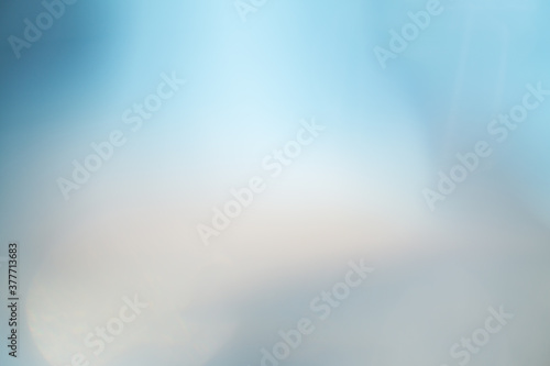 abstract blue blurred background with flare light 