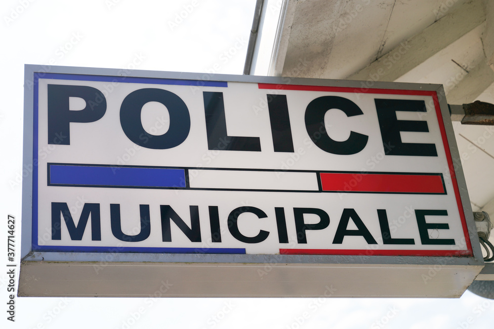 police municipale means in french mayor Municipal police in city with text sign