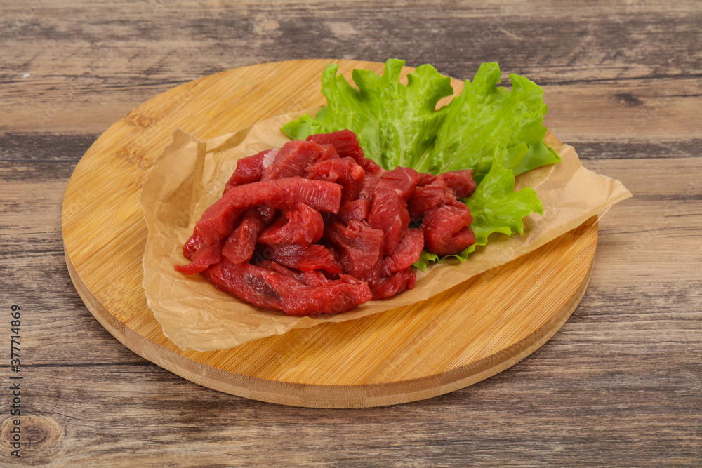 Raw beef meat sliced for cooking