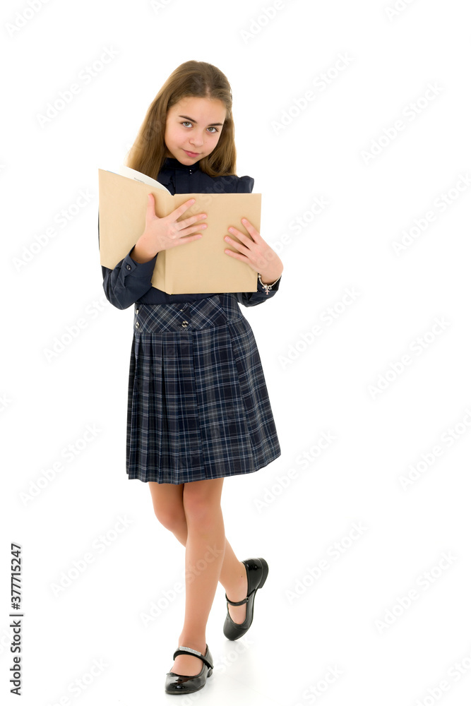Girl schoolgirl with book.Isolated on white background. Girl schoolgirl with book.Isolated on white background.