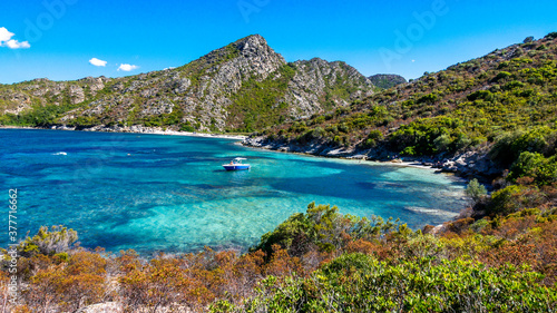 Fototapeta Naklejka Na Ścianę i Meble -  Corsica beach with turquoise sea and paradise beach. Saint Florent Corsica France.