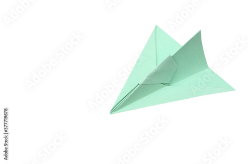 A green paper plane
