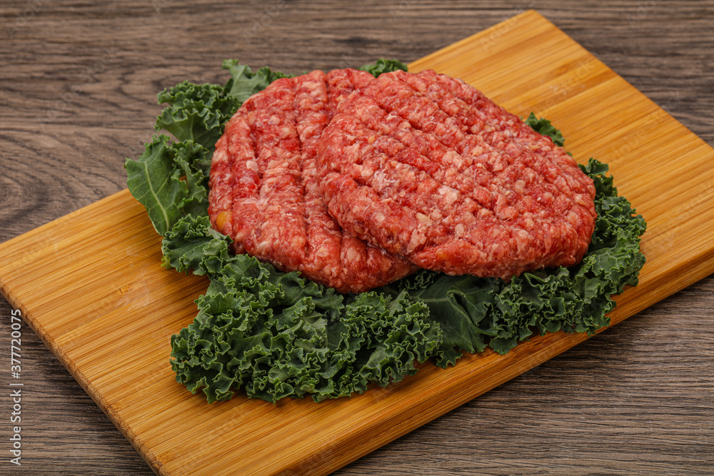 Raw beef burger cutlet for cooking Raw beef burger cutlet for cooking
