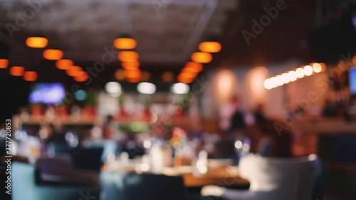 image of blurred bokeh background with warm orange lights
