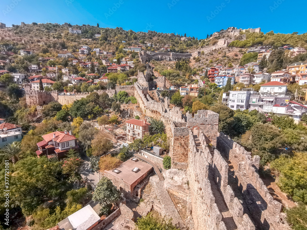 View of residential buildings and the old fortress wall of Alanya from the tower
