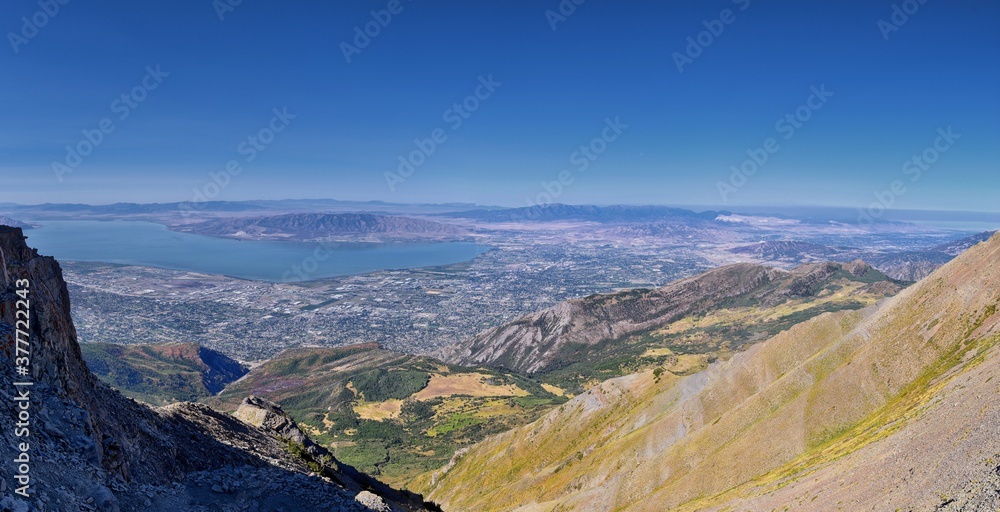 Fototapeta premium Timpanogos hiking trail landscape views in Uinta Wasatch Cache National Forest, around Utah Lake, in the Rocky Mountains in fall. Views of Midway, Heber, Provo city, Salt Lake and Utah County. USA.