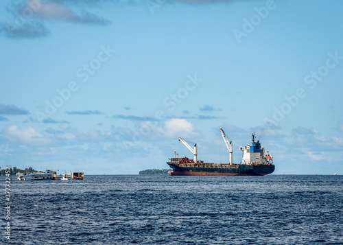 A container ship near the Maldives in the Indian ocean