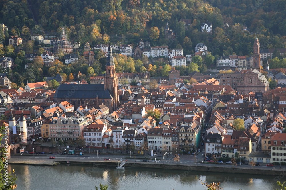 Aerial view of  Heidelberg old town with Church of the Holy Spirit and jesuit church during sunset in autumn in Heidelberg, Germany