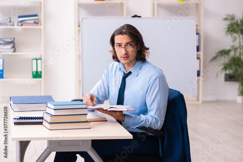 Young businessman student studying at workplace