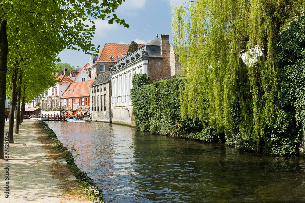 Historic centre of Bruges, Canal, Tourist boat, Belgium, Unesco World Heritage Site. Historic centre of Bruges, Canal, Tourist boat, Belgium, Unesco World Heritage Site.