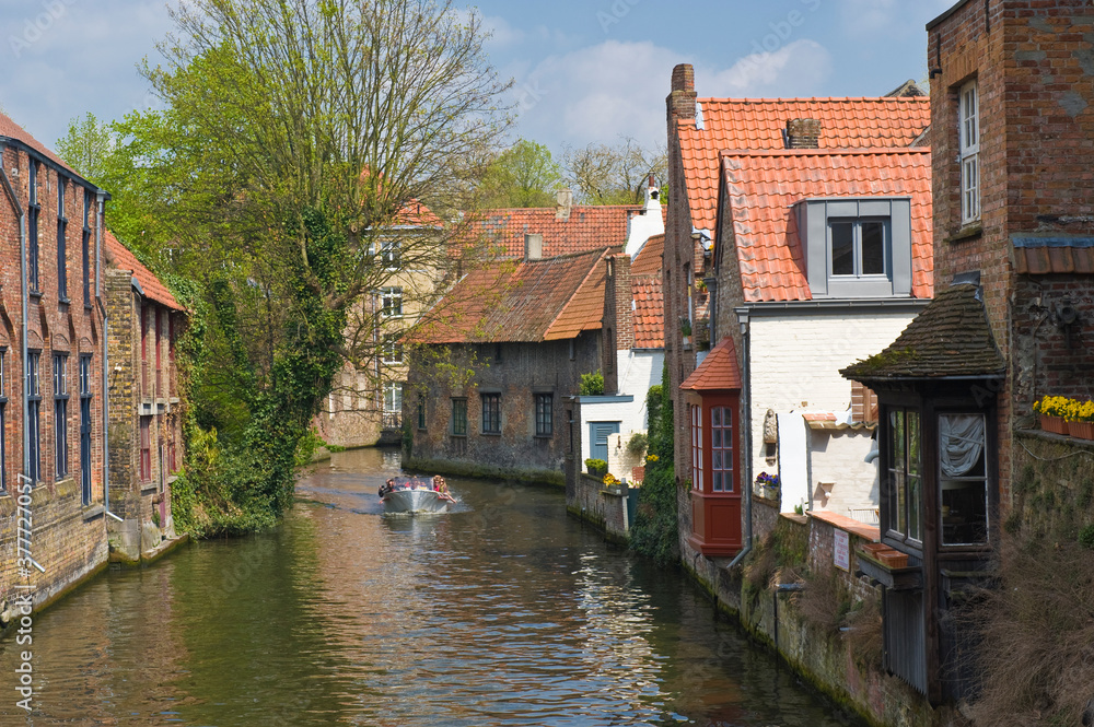 Historic centre of Bruges, Canal, Tourist boat, Belgium, Unesco World Heritage Site.