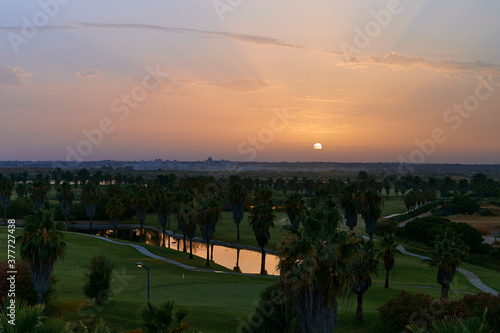 View over Salgados golf field at sunset