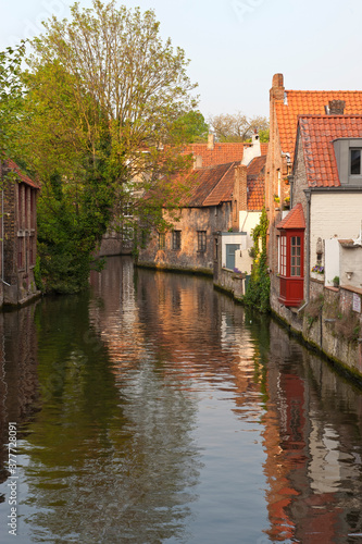 Building reflecting in the water, Historic centre of Bruges, Belgium, Unesco World Heritage Site.