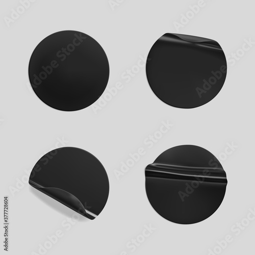 Black glued round crumpled sticker mockup set. Adhesive clear black paper or plastic stickers label with glued, wrinkled effect on grey background. Templates label or price tags. 3d realistic vector
