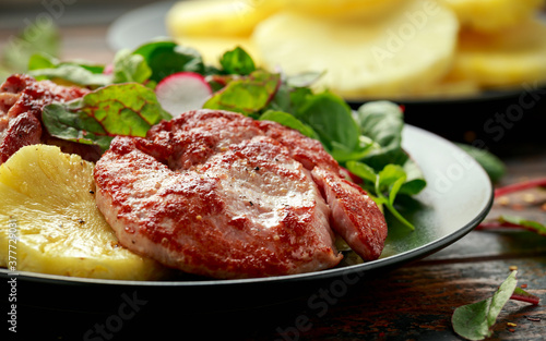 Fried Gammon steak with pineapple, french fries and vegetables