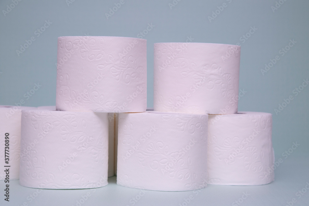 Toilet paper on a green background. Hygiene product. Toilet paper on a green background. Hygiene product.