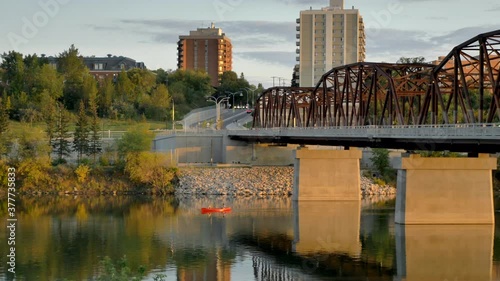 Adventurers Canoeing under Bridge in Saskatoon, Sk, Canada photo