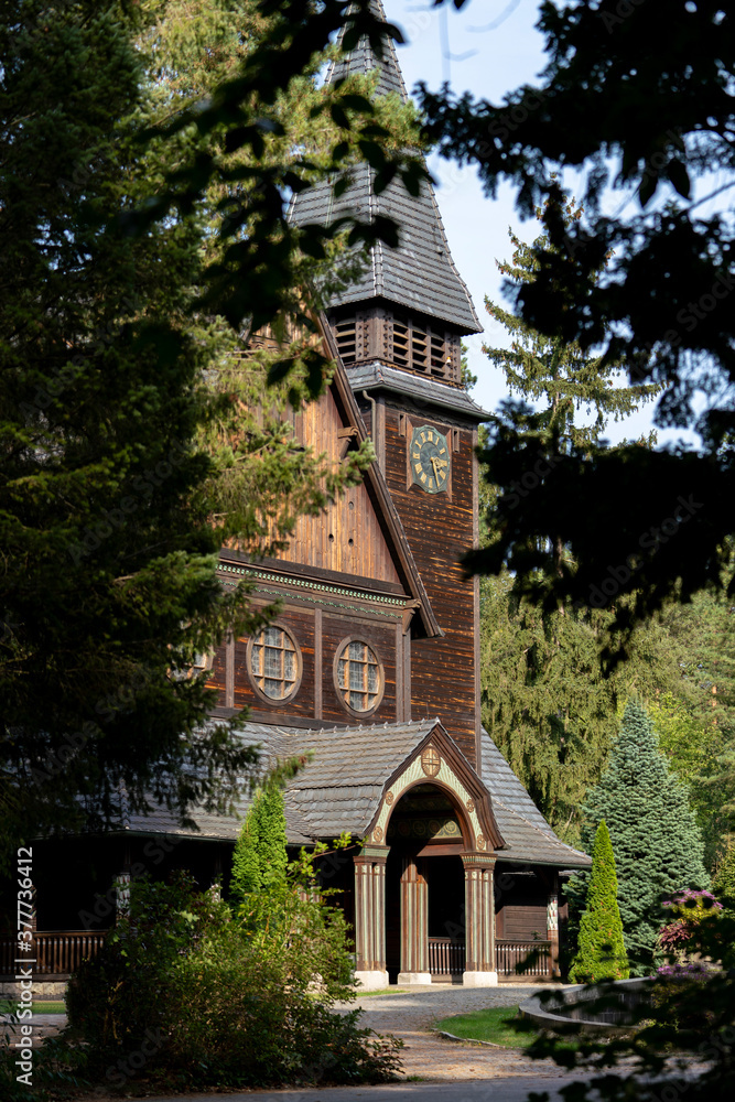 Naklejka premium historical cemetery chapel stahndorf, dark tv series, stave church in the forest