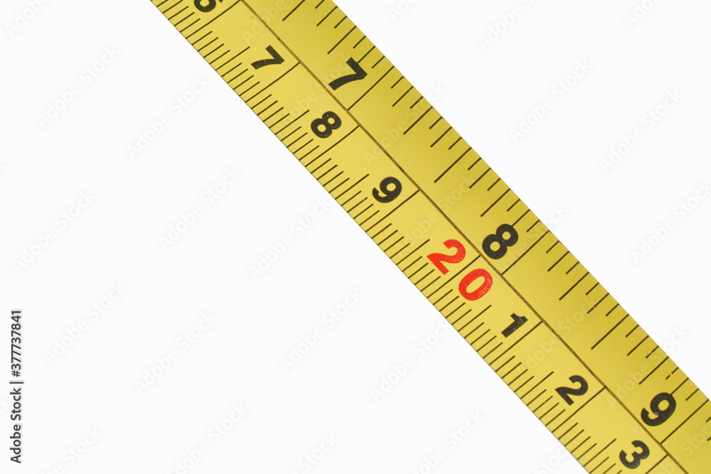 Yellow Measuring tape for tool roulette or ruler isolated on white background. Repair and construction concept. Yellow Measuring tape for tool roulette or ruler isolated on white background. Repair and construction concept.
