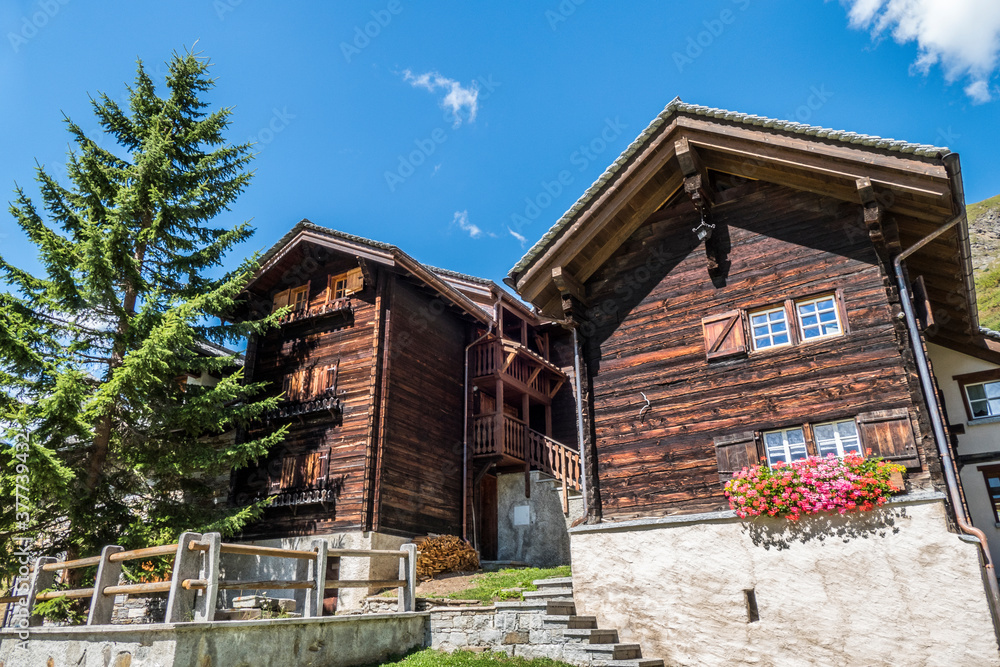 wooden mountain house with flowers