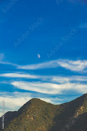 Rising moon over mountain ranges beautiful retro photo
