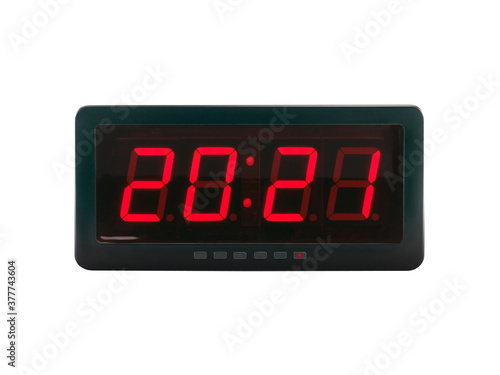 red led numbers 2021 on black digital electric alarm clock display isolated on white background
