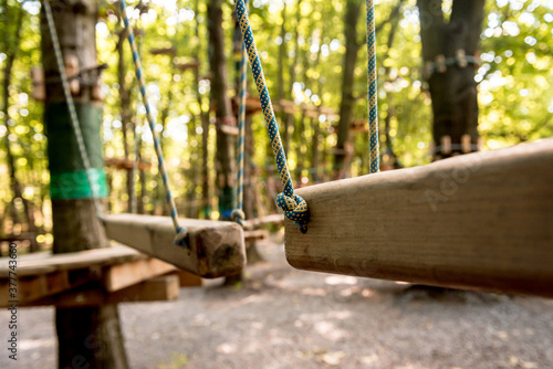 Rope park in a forest. Adventure summer park.