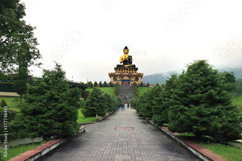 Buddha Park of Ravangla. Beautiful huge statue of Lord Buddha, at Rabangla, Sikkim, India. Gautam Buddha statue in the Buddha Park of Ravangla in South Sikkim. Frame within a frame concept. photo