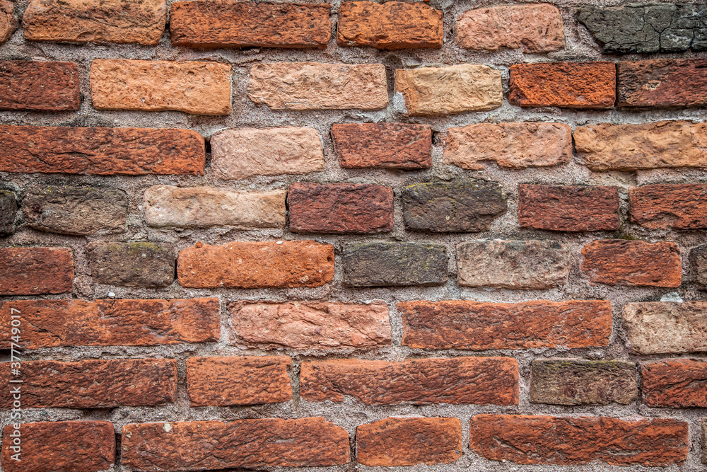 Obraz premium Ancient brickwork on the Scaliger bridge over the Adige river in Verona. Veneto, Italy