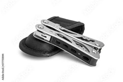 Folded multitool with black case and white background