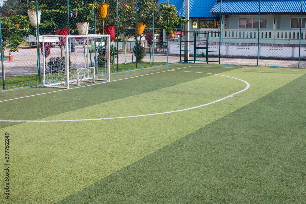Soccer field with artificial turf in a stadium