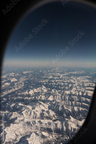 Alpine airplane window view (British Airways)