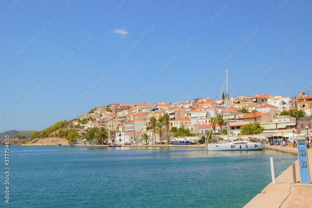 Ermioni, Greece, Peleponnese, boats in theharbour and the town
