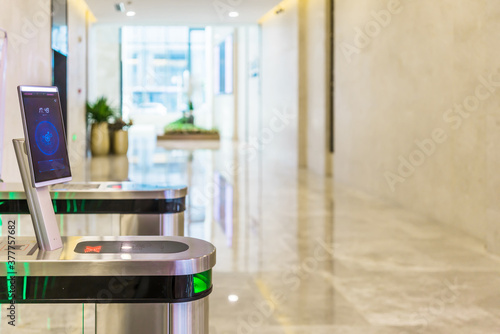 Картината върху платно turnstile gate in office building with digital facial scaner.