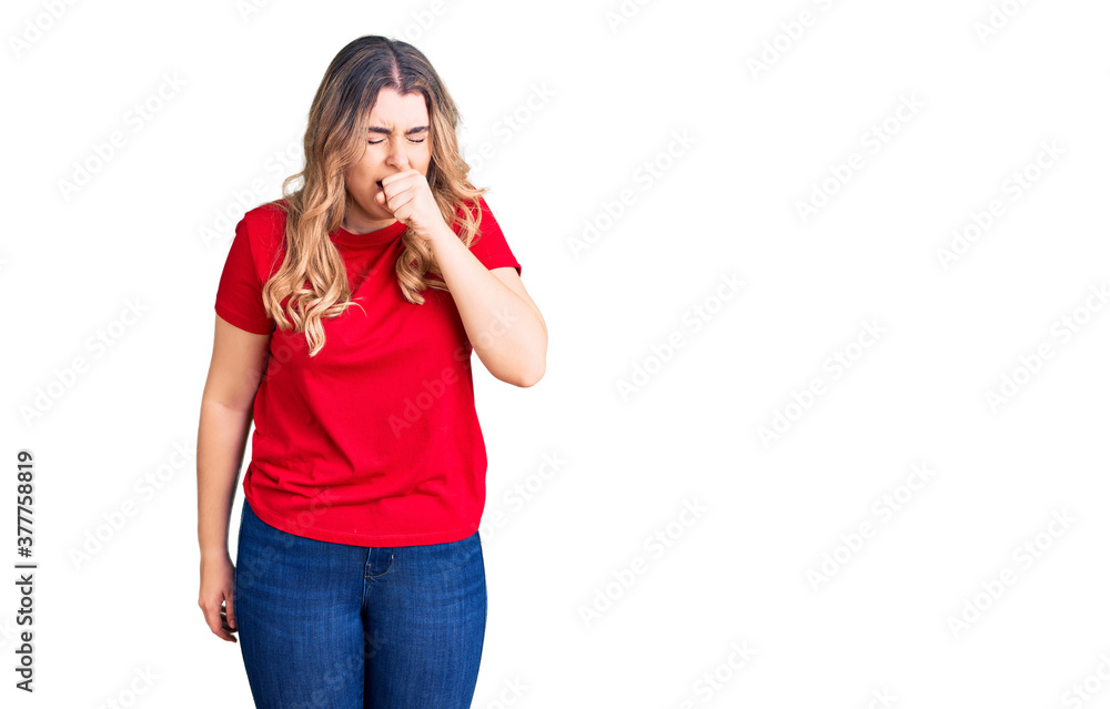 Young caucasian woman wearing casual clothes feeling unwell and coughing as symptom for cold or bronchitis. health care concept. Young caucasian woman wearing casual clothes feeling unwell and coughing as symptom for cold or bronchitis. health care concept.