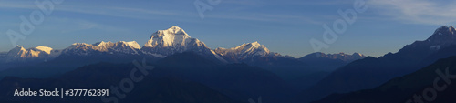 Sunrise panorama view on Annapurna Mountain Range from Poon Hill. Viewpoint on the Annapurna Circuit. photo