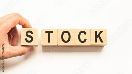 Word stock. Wooden small cubes with letters isolated on white background with copy space available.Business Concept image.