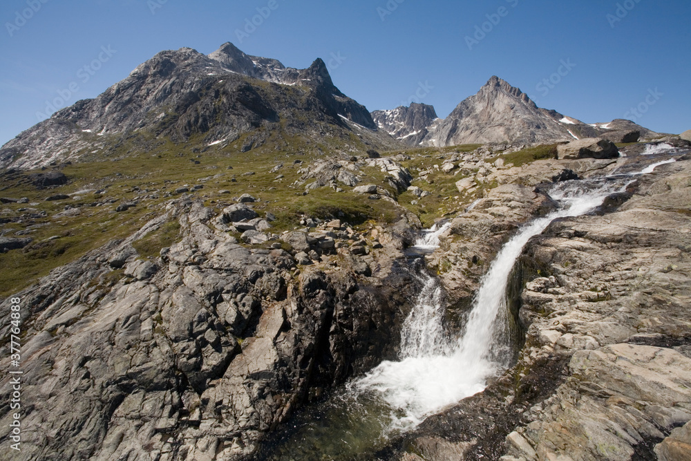 Waterfall and Mountain Landscape, Aappilattoq, Greenland Waterfall and Mountain Landscape, Aappilattoq, Greenland