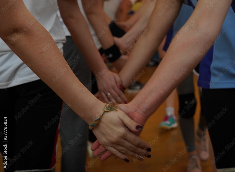 group of people holding hands