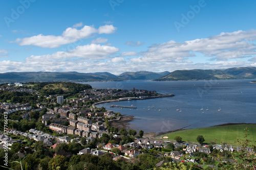 Scenic view of the town and harbor of Gourock in Inverclyde in Scotland. Blue sky, sunny day in the Greenock area.