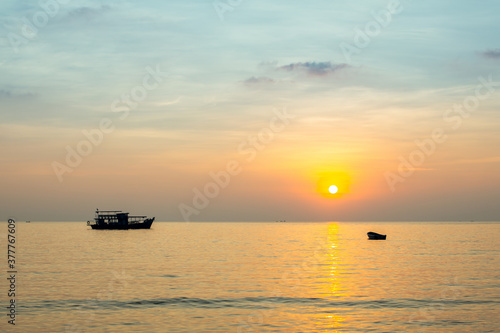 Sunset of the Sea with a ship and a boat. Thailand, Gulf of Thailand. © De Visu