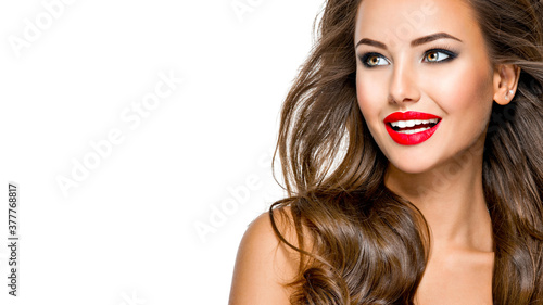 Beautiful pretty happy woman with bright makeup and long hair
