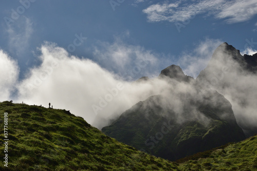 image of Silhouette of a climber climbing a mountain