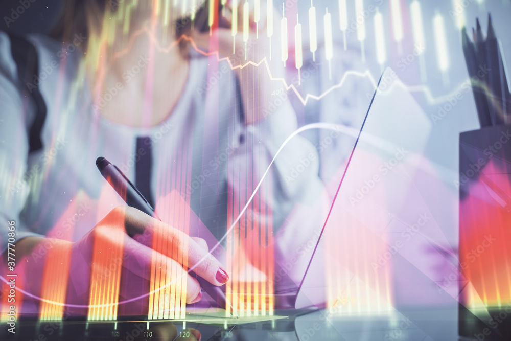 Double exposure of woman hands typing on computer and financial graph hologram drawing. Stock market analysis concept. Double exposure of woman hands typing on computer and financial graph hologram drawing. Stock market analysis concept.